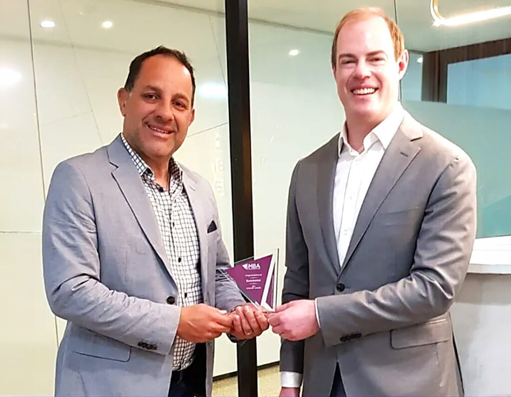 Maurizio Manzi receiving the Best Small Business award